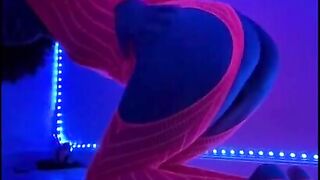 Bitch in Neon Fishnets Bodysuit Fingers and Bangs Herself in the Darksome