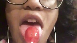 Whore sucks on a sweetmeat