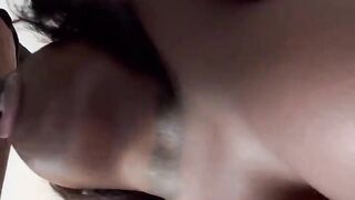 Black floozy sucking a schlong