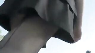 Teen in short ebony petticoat and ebony nylons upskirt