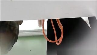 Playgirl wears bikini in beach cabin