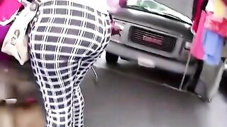 Large butt woman in ebony and white leggings