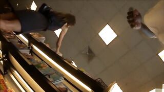 Hawt shopaholic is wearing red underclothing beneath her suit