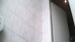 Cute playgirl peeing in WC