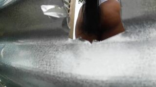 Camera records hawt Latin babe (LARGE ASS) in beach locker room