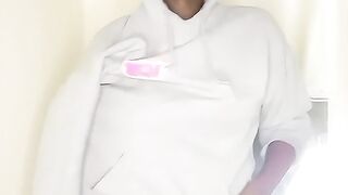 Natural black teen takes off her sports raiment