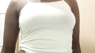 Amateur black teen is teasing showing her breasts