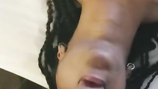 Black Girl taking a Facial on the Bed
