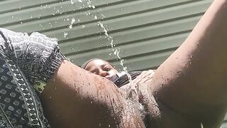 Easily caught squirting black twat in daylight outside!