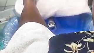Black big beautiful woman gets pedicure
