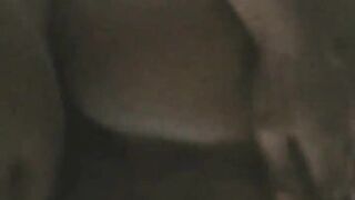 Slow mo of large black booty taking knob