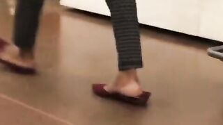 slender black feet soles flopping
