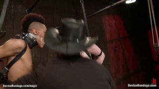 Black Nikki Darling and brunette hair Katharine Cane are tied and mounted with all weight on cunt on board by lezdoms Mz Berlin and Claire Adams on device slavery