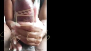 Ebony beauty the color of sin gives a footjob to NegroTop's biggest 24cm schlong