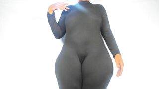 Hour Glass Shaped Large Booty Mistresse in taut Jump-dress....
