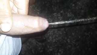 Black large ebony dick pissing