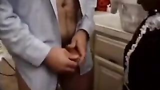 Cute Ebony midget maid irons more than pants!