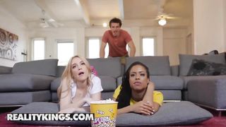 Reality Kings - Ebony and white fit bbfs share cock at movie night