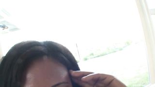 Ebony lady with big tits is riding a big, white dick, in the middle of the day