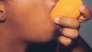 Hawt throat black playing with a mango