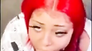 Red haired cutie is kneeling on the floor during the time that sucking a punk hard wang like a pro